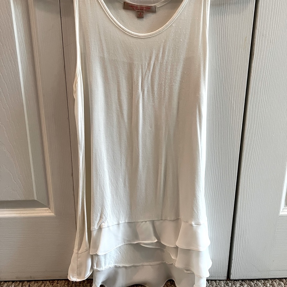 White sleeveless dress top